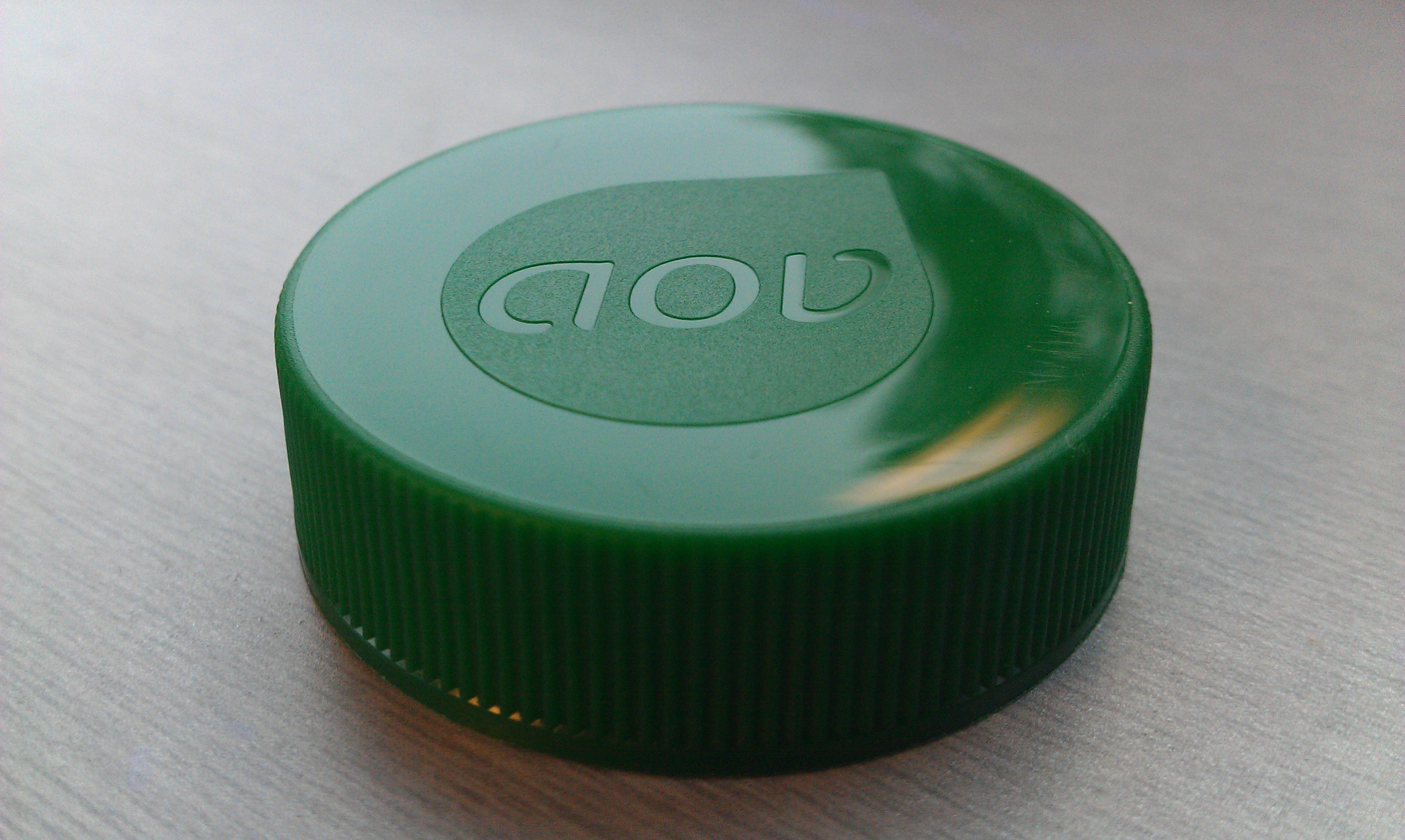 PI0036.b | 5097.85 | 38MM Schroefdop Groen logo IHS